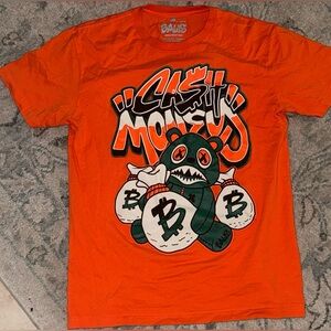 Bold Orange Graphic Tee with Bear Design
